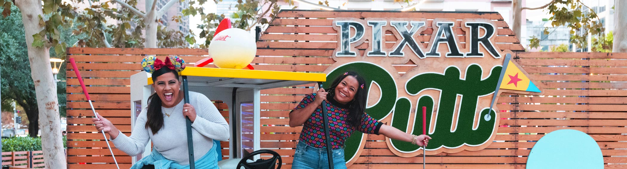 Women Playing Mini Golf at Pixar Putt at Navy Pier Cropped